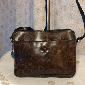 PATRICIA NASH 10th Anniversary dark brown stone design print leather crossbody.